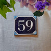 Plaque numéro de rue bleue
